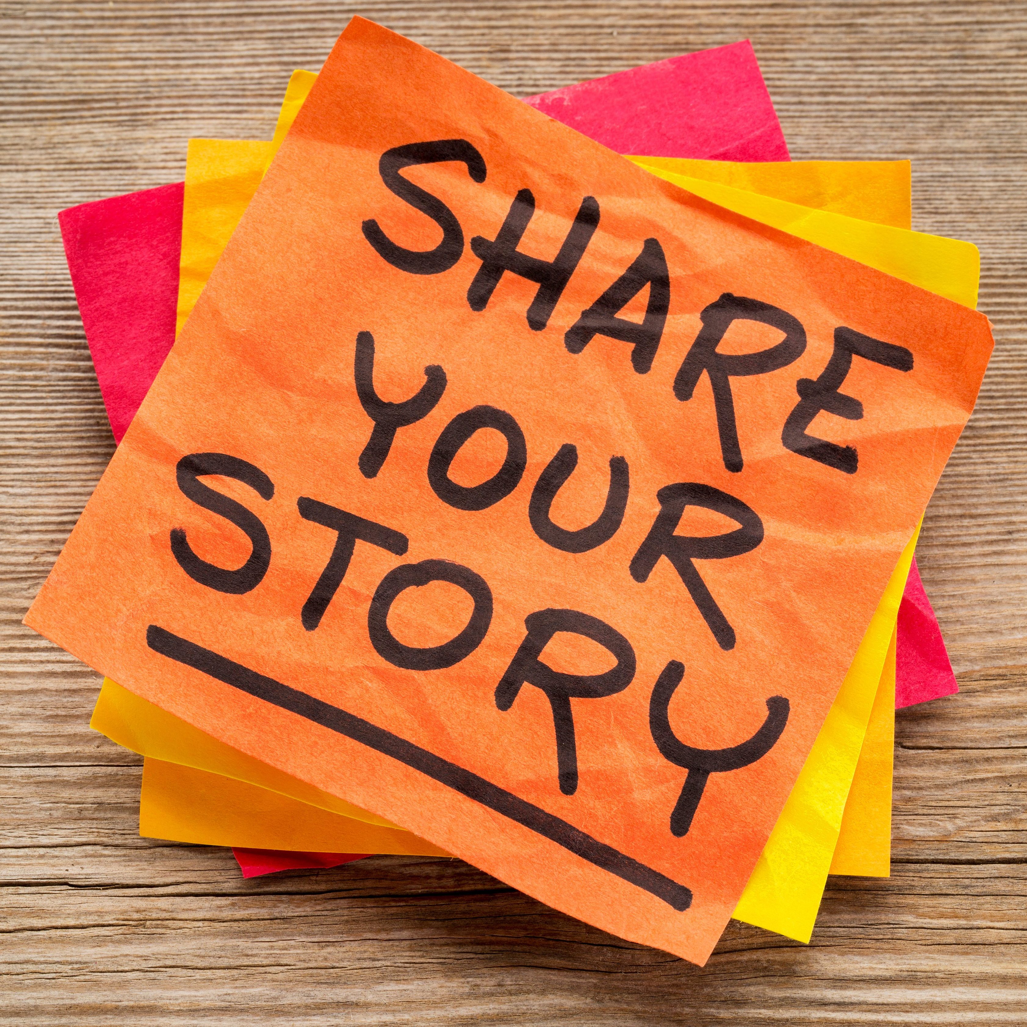 share your story suggestion on a sticky note against grained wood